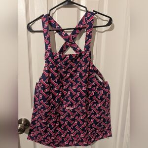 Buckhead Betties Child's Apron Navy Blue with Pink Dog Bone Pattern